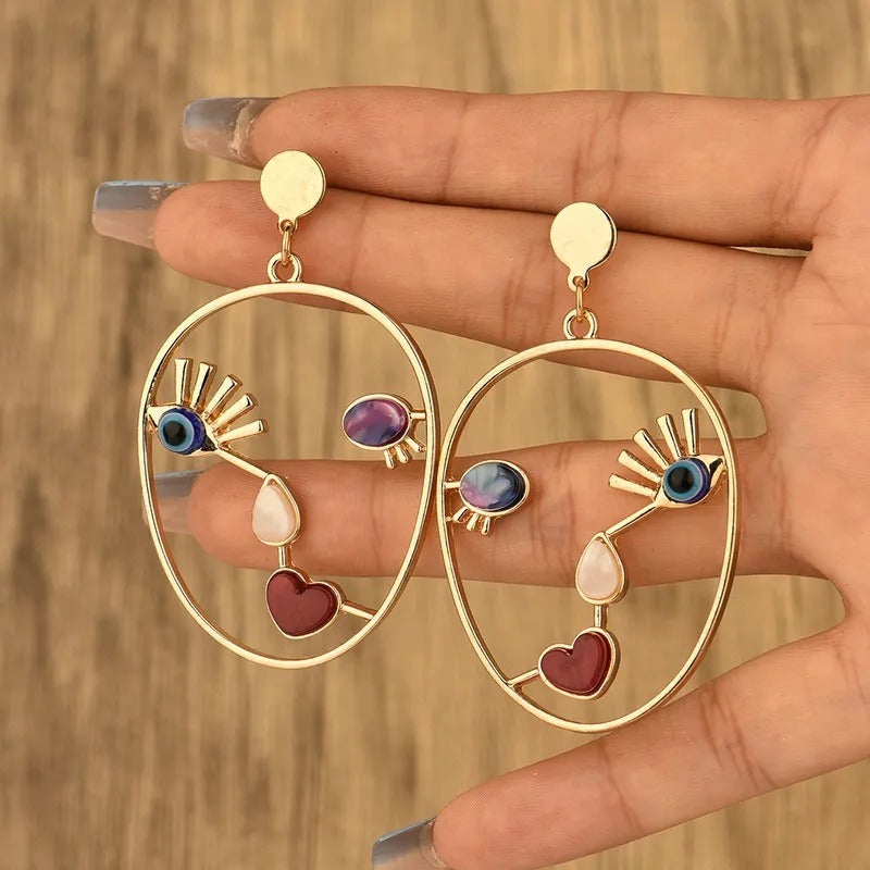 Facial mask earrings exaggerated personality asymmetrical demon eyes earrings female